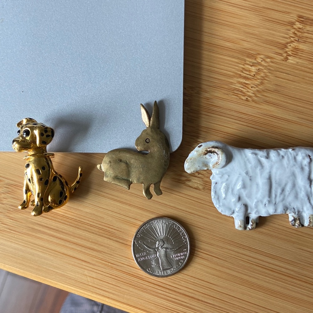 Three animal pins